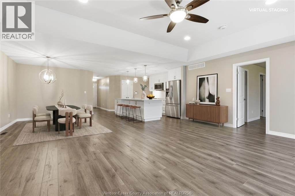 Virtually staged dining and kitchen area