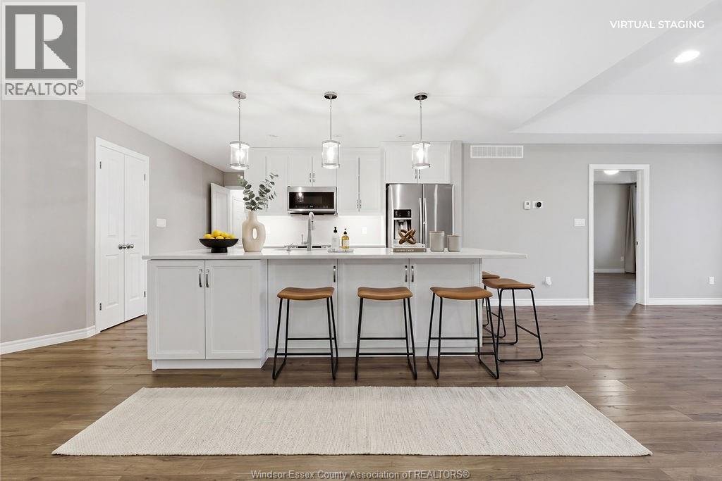 Virtually staged modern kitchen with island seating